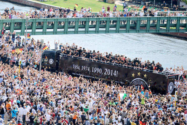 Photo - World Cup heroes return to rousing welcome Photo - World Cup heroes return to rousing welcome