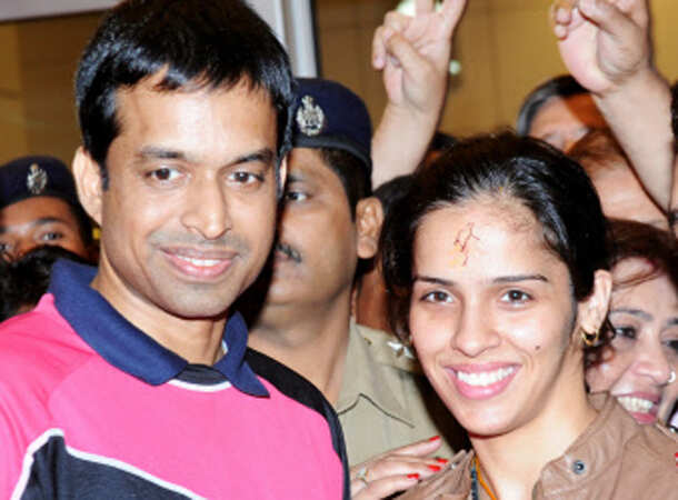 Champion Saina returns home 
