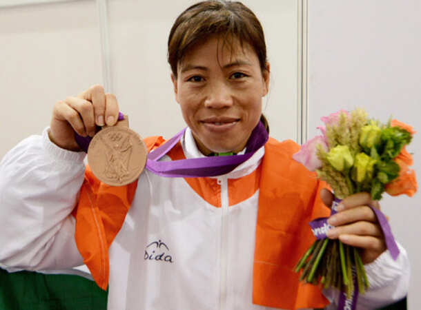 Mary Kom with historic bronze medal