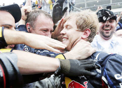 Vettel wins third successive F1 World title