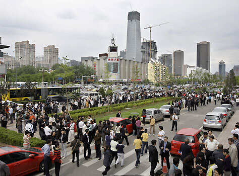 People evacuate offices in Beijing