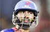 Karthik fifty drives Delhi to 164/7