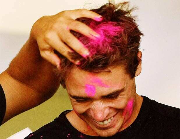 New Zealand players celebrate Holi