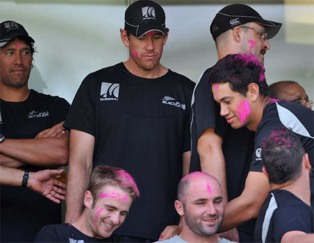 New Zealand players celebrate Holi