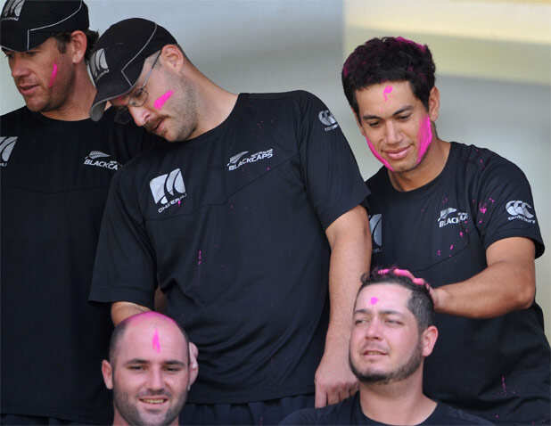 New Zealand players celebrate Holi