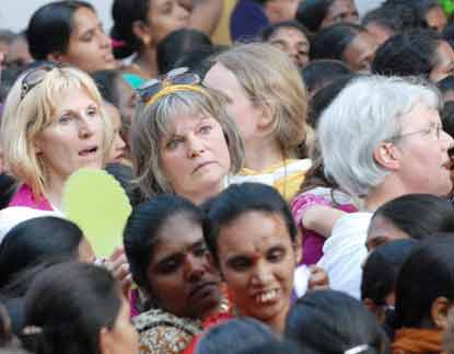 Foreigners visit Puttaparthi for Sai darshan