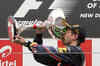 Red Bull F1 driver Vettel celebrates his win