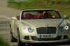 Admiring the luxury convertible Bentley GTC