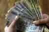 Rupee crashes to lifetime low of 52.50/dollar