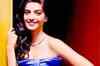 Sonam Kapoor tackles media at an event