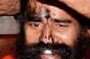 Black ink thrown at Baba Ramdev's face