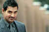 Caught on cam: John Abraham shoves a fan