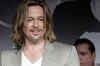 Brad Pitt dispels wedding date rumors at Cannes