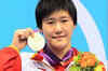 Chinese in London hail their Olympics teen swim star