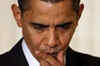 Obama's sky-high popularity dips in first month