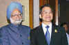 Manmohan meets Chinese premier to ease tensions