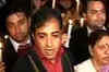Protesters gather outside Rathore's residence