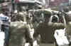 Protestors clash with police in J&K over pay hike