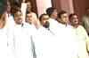 Opposition members protest outside parliament