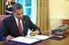 Obama passes bill to hike visa fees