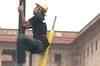 Greenpeace activists held for protesting outside Parliament
