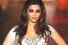 Ash dazzles on the ramp in bridal wear