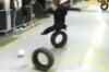Footballer Rooney takes the 'Tyre Challenge'