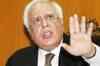 Justice Patil submits 2G report to Sibal, names guilty officials