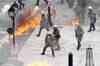 Thousands march in Athens, clash with police