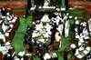 Uproar in Lok Sabha as Mamata presents rail budget