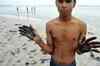 Oil spills at Mumbai shores, officials say threat minor